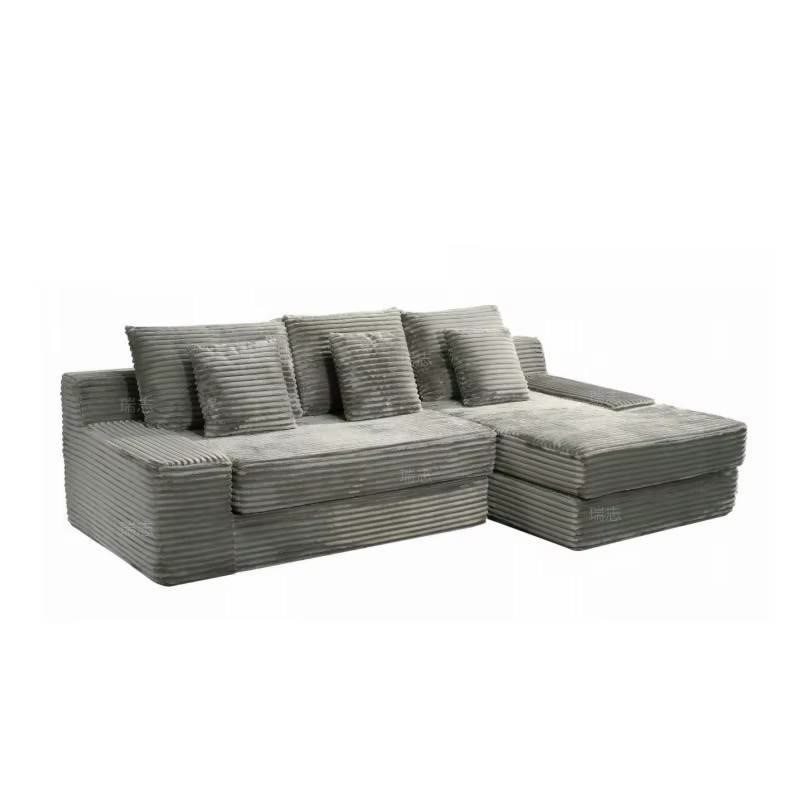 Jerry's grey L-shaped three-seater sectional with chaise